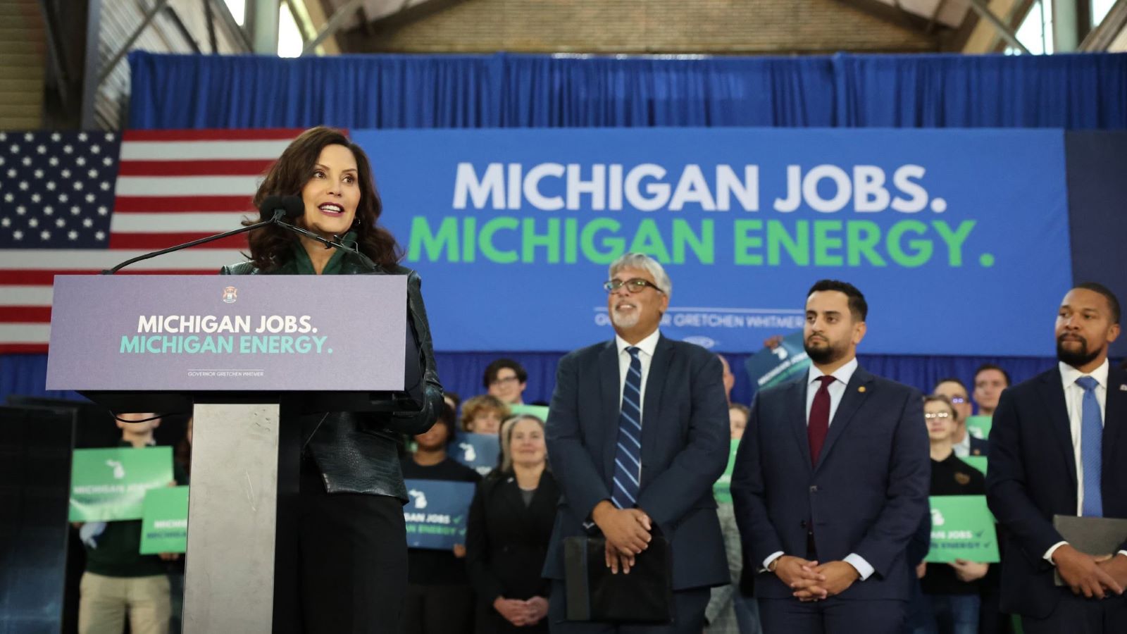 Michigan Governor Whitmer speaking at the clean energy package signing event.